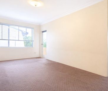 Sunlit, 2 bedroom residence with a lock up garage - Photo 5