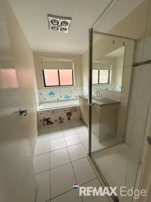 “Family Comfort and Contemporary Style in a Sought-After Location” - Photo 1