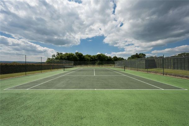 An extensively refurbished five bedroom country house with an indoor pool and tennis court in south Farnham under 2 miles from the centre of Farnham town. - Photo 1