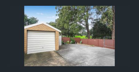 Spacious Brick Family Home with Flexible Living Options - Photo 2