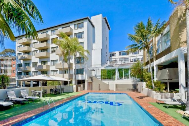 Move-In Ready Studio with Leafy Outlook and Resort Amenities - Photo 1