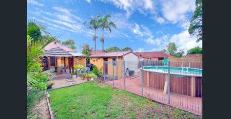 Modern Tranquillity in the Heart of Convenience – Stylish 4-Bedroom, 2-Bathroom Home - Photo 4