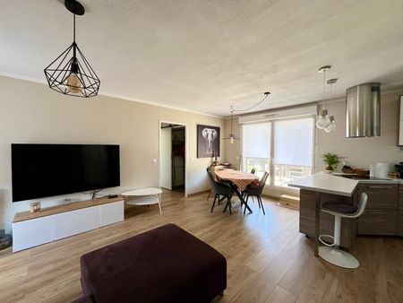 Appartement à louer - Photo 2