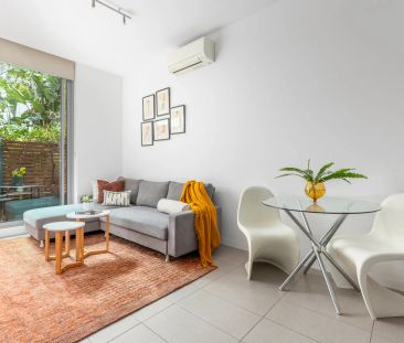 Peaceful Courtyard Retreat in a Vibrant Urban Setting - Photo 1