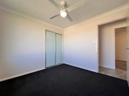 NEAR NEW 4 BEDROOM HOME - Photo 5