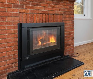 Charming CBD Cottage with Character & Sunlit Living - Photo 1