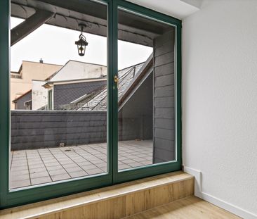 Wohnen mit Charakter – großzügige Dachgeschosswohnung im Herzen von... - Foto 1