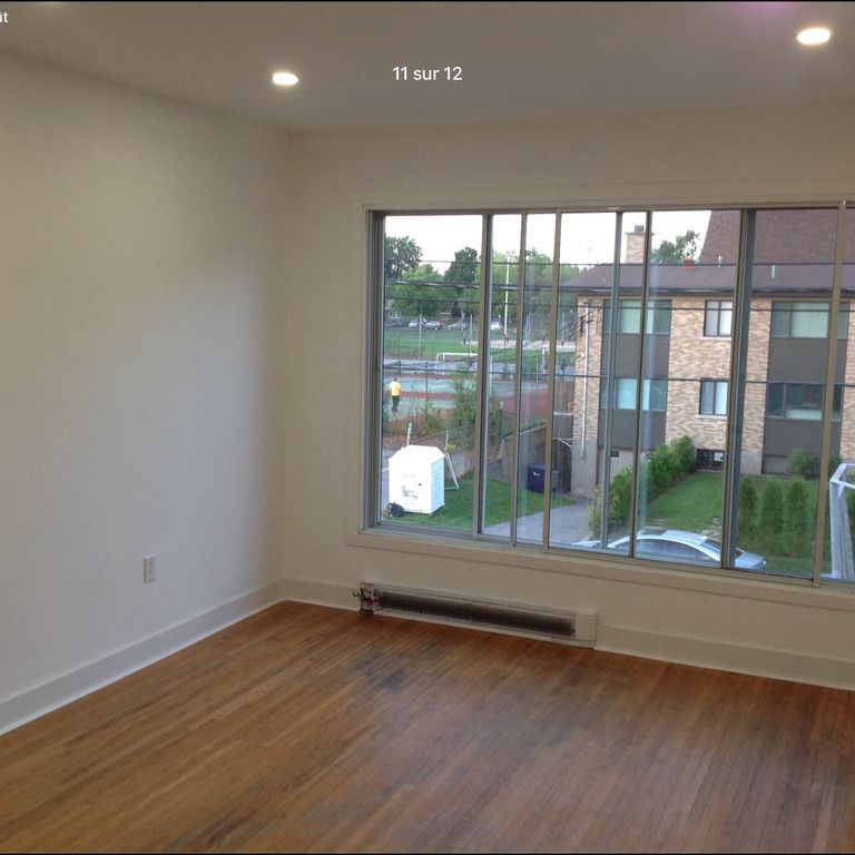 Grand 5 1/2 Haut Triplex - Photo 1
