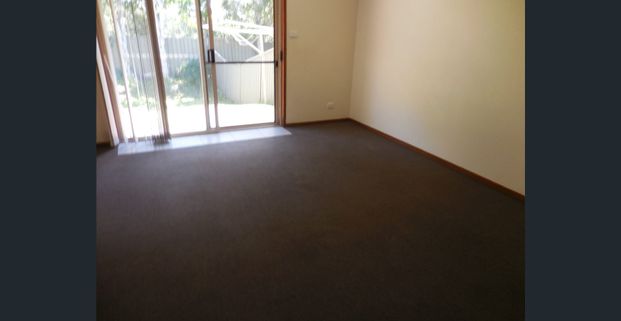 Two bedroom duplex villa with single garage - Photo 1