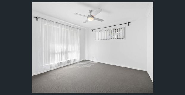 LOW MAINTENANCE 4 BEDROOM HOME IN BANYO - Photo 1