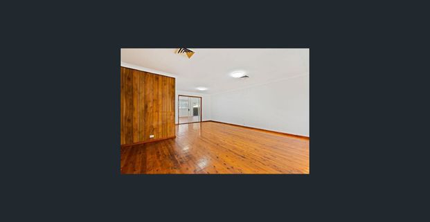 Four Bedroom Family Home with Sunroom and Garden Shed - Photo 1