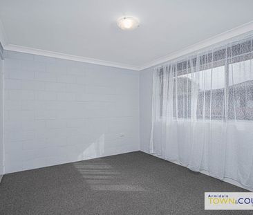 Two bedroom, bright unit must be inspected today! - Photo 3