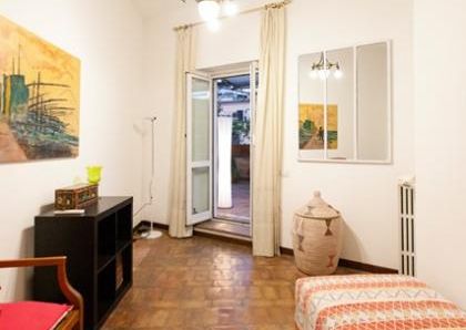 Attic-Monti: 1-6 month rentals. Spacious, furnished 3 Bedroom, 2 bath, living room, dining room, study and large panoramic terrace. Bright, silent, located in well kept Palazzo d’Epoca with elevator and doorman. Near transport and Metro.