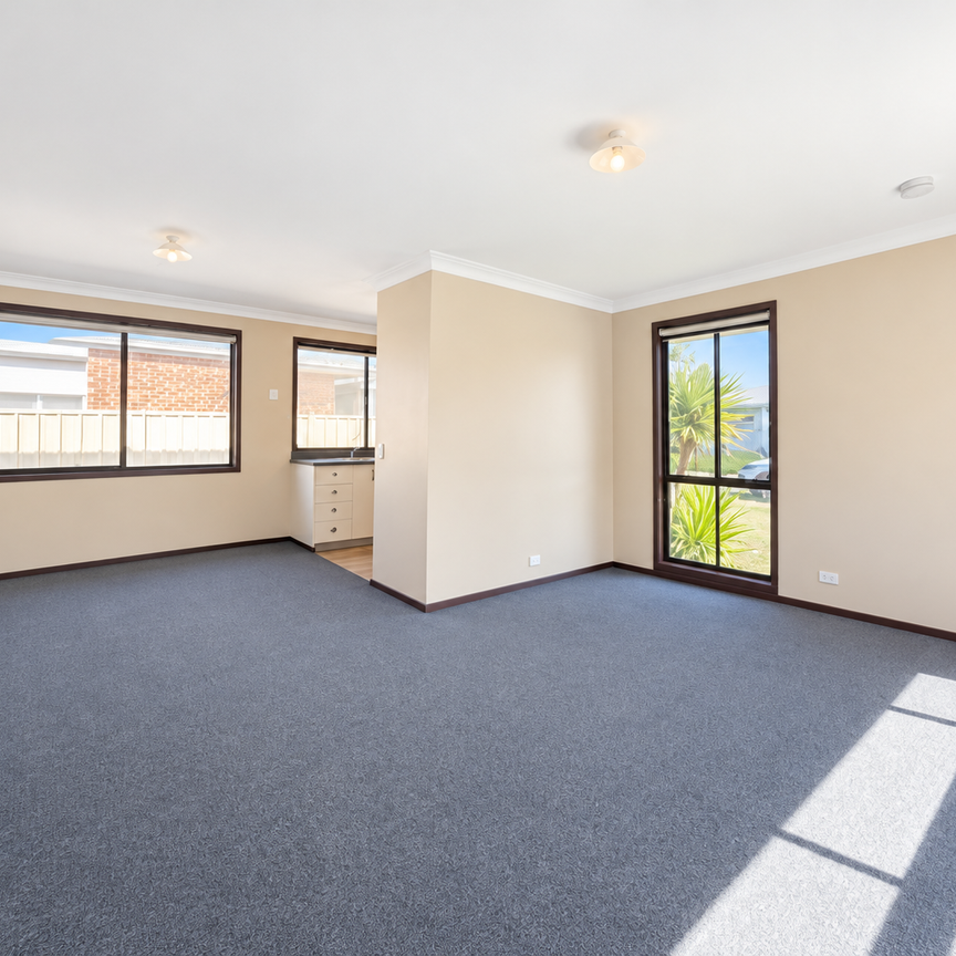 Comfortable 3-Bedroom Home in a Convenient Location - Photo 1