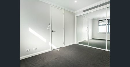 Low maintenance, modern living - Photo 3