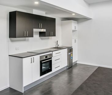 Industrial Loft Style Unit With Central Convenience & Water Views - Photo 4