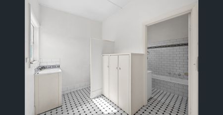 Character Home with Expansive North-Facing Rear Yard - Photo 5