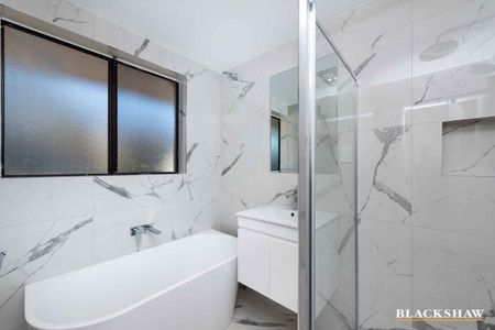 Renovated three bedroom home - Photo 2