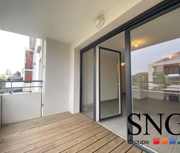 T2 AVEC BALCON ET PLACE DE PARKING - Photo 2