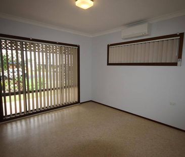LOW SET AIR-CONDITIONED UNIT WALKING DISTANCE TO CBD - Photo 1