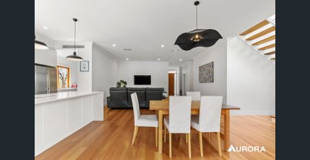 Elegant family residence featuring a pristine magnesium in-ground swimming pool and solar! - Photo 4