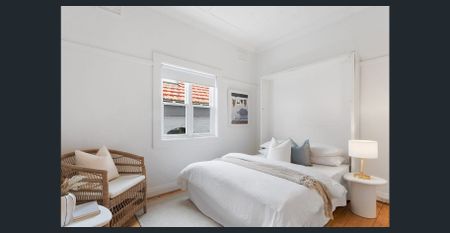 Sun-Drenched Coastal Semi with Charming Period Features - Photo 3