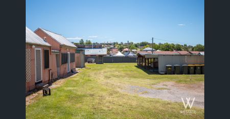 NEAT AND LOW MAINTENANCE LIVING - Photo 2