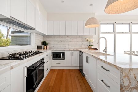 Architectural Brilliance with Panoramic Bay Views - Photo 3
