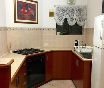 Spacious City-to-Coast Living | Secure 3 Bedroom Unit with Balcony - Photo 6