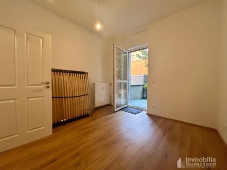 Moderne 3-Zimmer Erdgeschosswohnung mit Garten - Foto 5