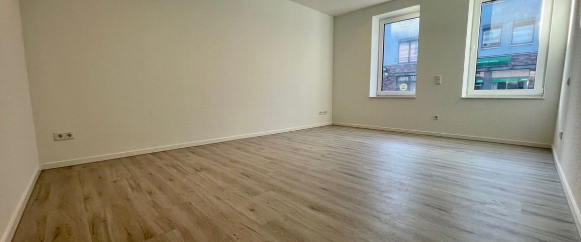 Zentrale Erdgeschosswohnung als Erstbezug - Foto 1