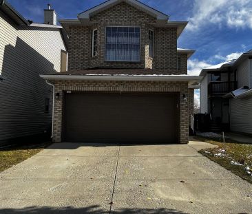 Welcome to Beautiful Family Home in the Desirable Community of Bridlewood SW — 4 Bedrooms Main Floor - Photo 1