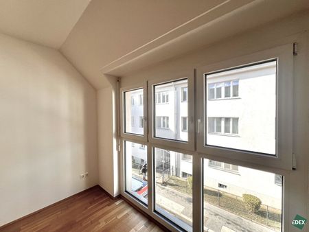 Moderne 2-Zimmer-DG-Wohnung mit sehr guter Anbindung - Photo 2
