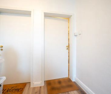 Altbaucharme trifft Komfort – Dachgeschosswohnung mit Klimaanlage - Photo 1