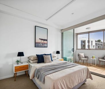 Modern One-bed + Study Apartment of Space and Convenience - Photo 3