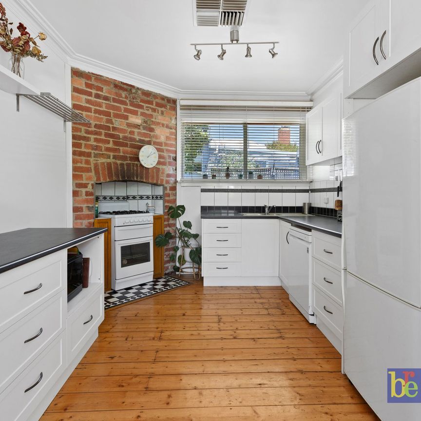 Charming and Convenient Living in Quarry Hill - Photo 1