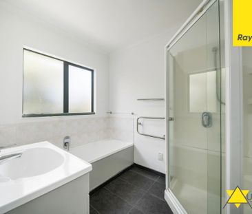 Charming 3-Bedroom Home with Decking in Handy Henderson Location - Photo 6