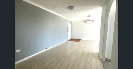 FULLY RENOVATED FLOOR 2 BEDROOM UNIT 500M TO AUBURN STATION - Photo 2