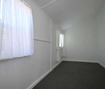Neat & Freshly Painted 3 bedroom home - Photo 2
