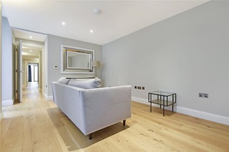 This is a recently renovated and beautifully designed apartment, which spans about 2,741 sq. ft. and is located in an impressive Grade II listed Robert Adam building on Portland Place. - Photo 2