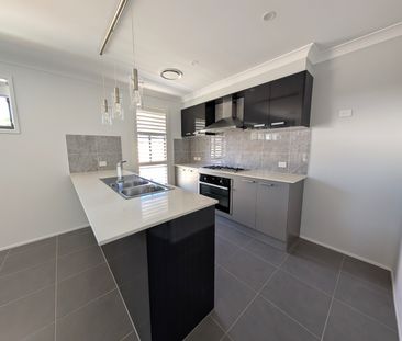 Modern 4-Bedroom Home in a Convenient Gorokan Location - Photo 4