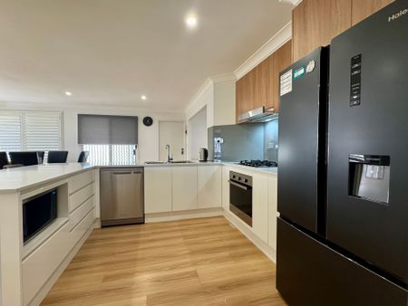 MODERN FAMILY HOME IN HIGHLY SOUGHT AFTER AREA! - Photo 2