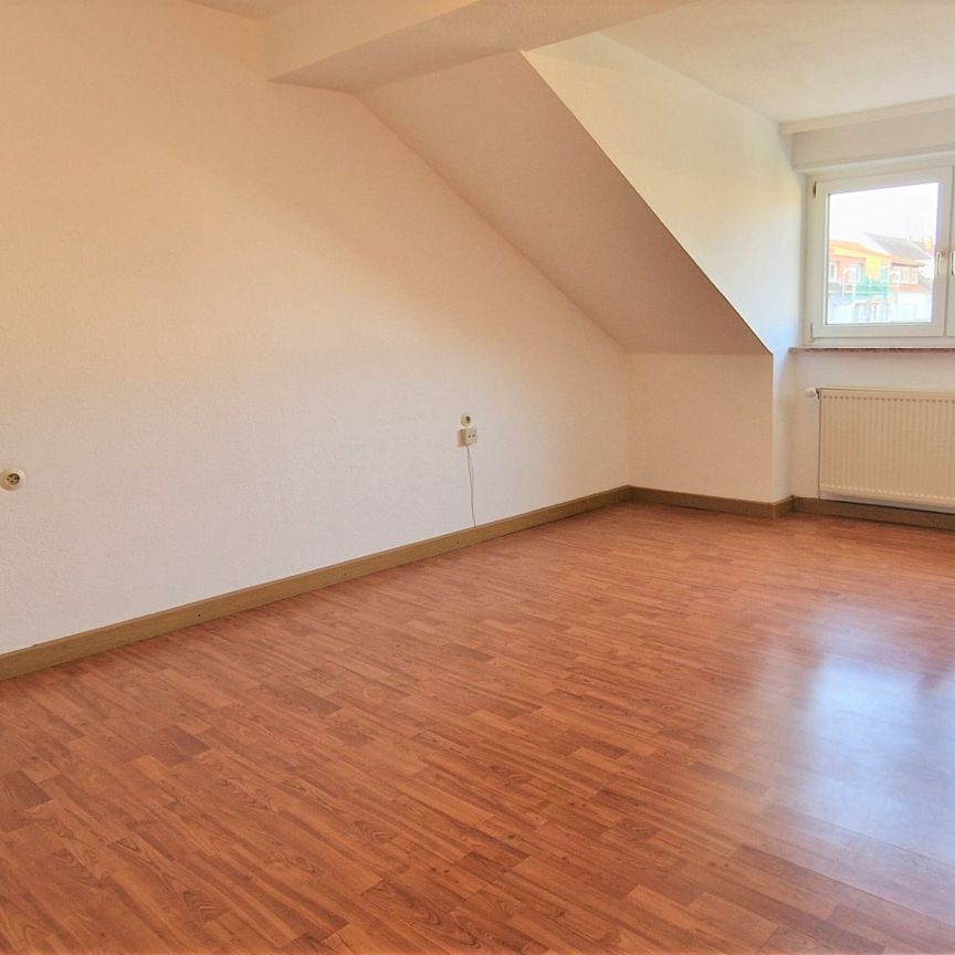 Gemütliche Dachgeschosswohnung mit Einbauküche - Foto 1