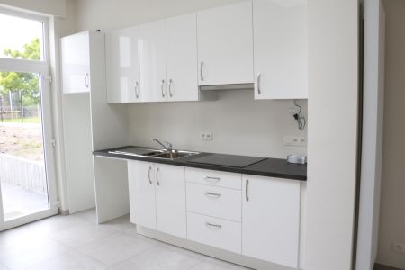 Gerenoveerde woning met 2 kamers te Dilbeek - Photo 2