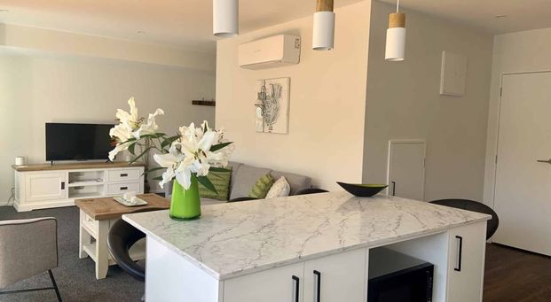 Immaculate Executive Inner City Apartment with Stunning River Location! - Photo 1