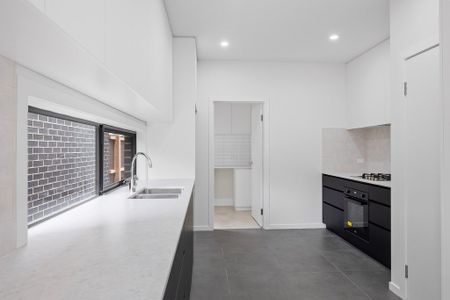 A SPACIOUS FAMILY RETREAT – TOWNHOUSE LIVING AT ITS BEST - Photo 4