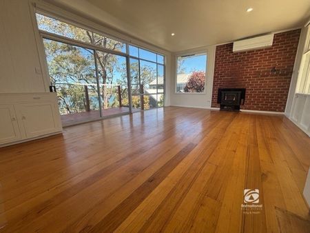 FRESHLY RENOVATED ON THE LAKES EDGE! - Photo 2