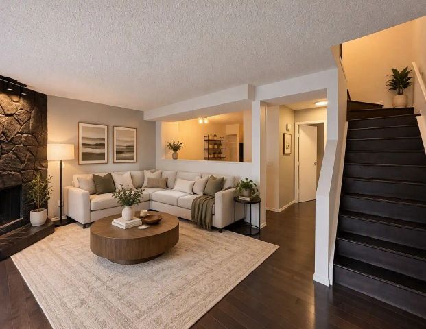 Spacious 2 Bedroom + Flex Townhome | 1.5 Bathrooms, Garage & In-Suite Laundry — 2 Bedrooms+ Den Townhouse - Photo 1