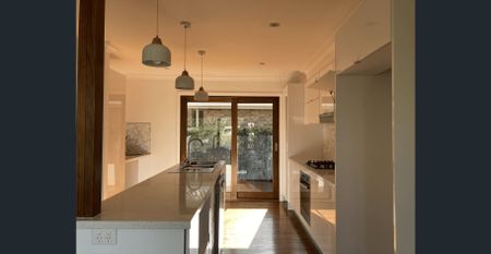 Stylish Renovation with Private Courtyard and Prime Position - Photo 2