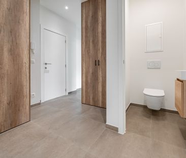 Ruim gelijkvloers appartement met 2 slaapkamers. - Photo 5